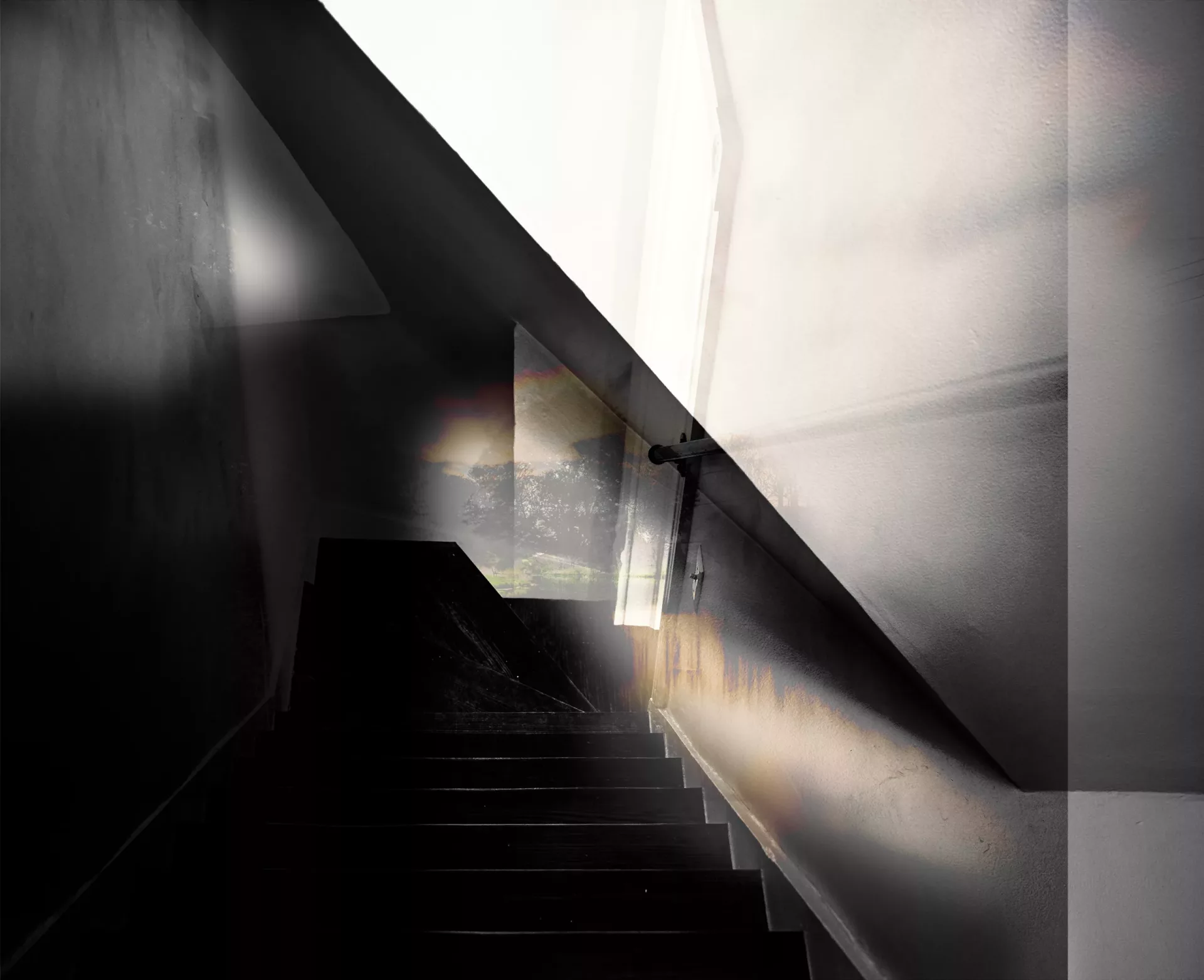 An abstract collage depicting a stairwell and the outdoors to illustrate uncertainty