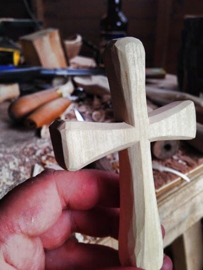 photo of a carved, wooden cross